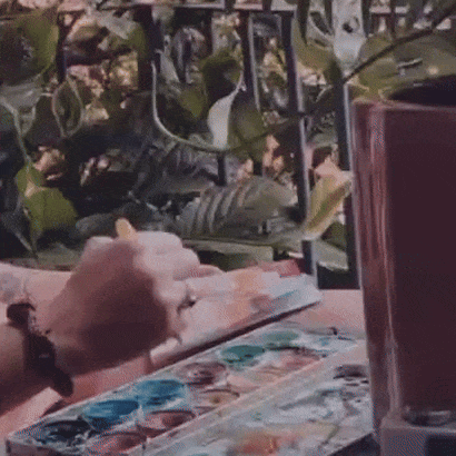 Video close up of Marianna's hand painting