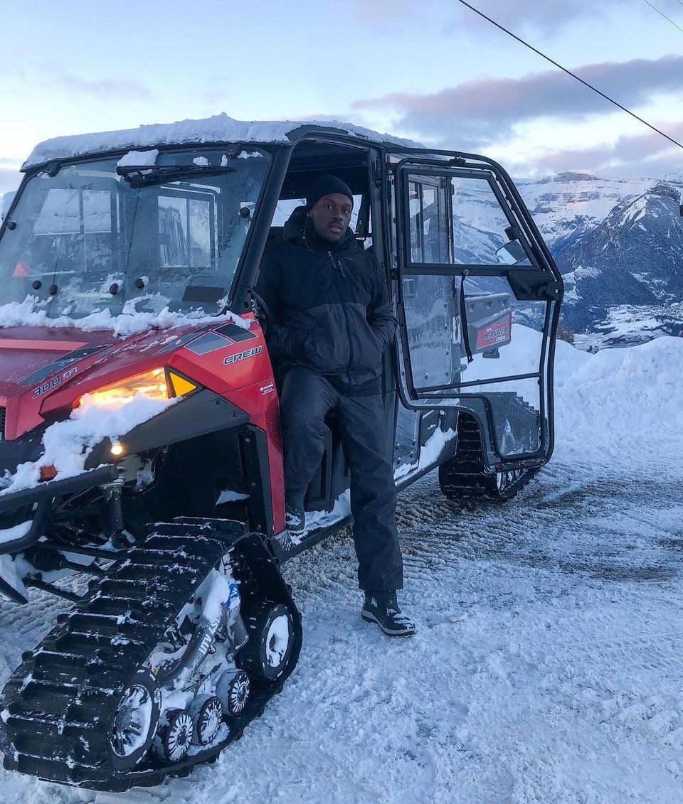 Man in snowmobile on mountain