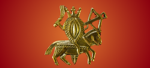 Vulva pilgrim pin, 14th century, vulva on horseback with scourge and crossbow