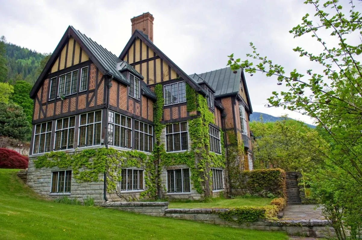 Blaylock Mansion's Tudor Revival style with ivy-covered walls.