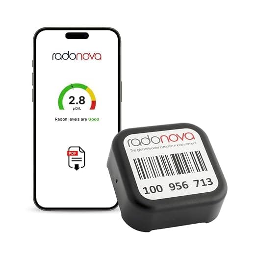 Radonova Radtrak³ alpha track radon detector beside a smartphone showing the Radonova app