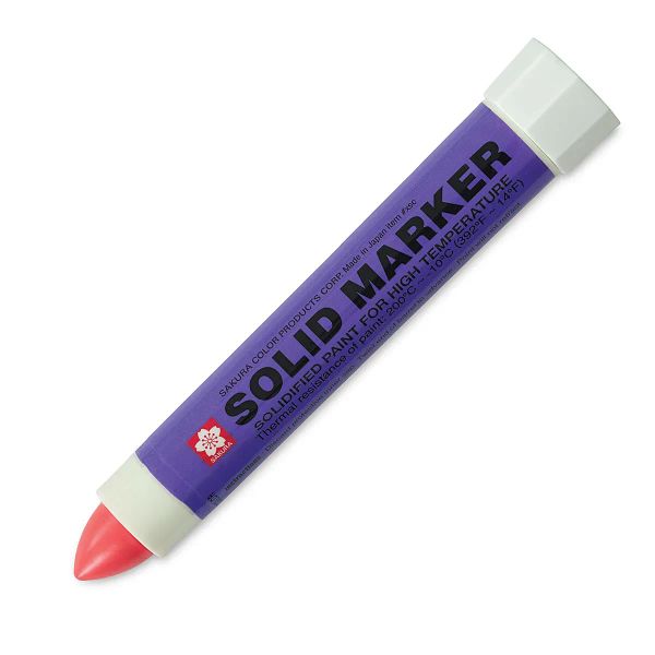 Sakura Solid Paint Markers marking on metal, wood, and glass surfaces in bold, vibrant colors.