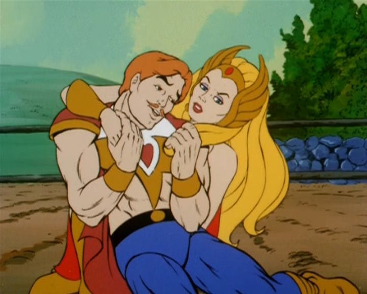 She-Ra with Bow in her arms in a scene from the cartoon