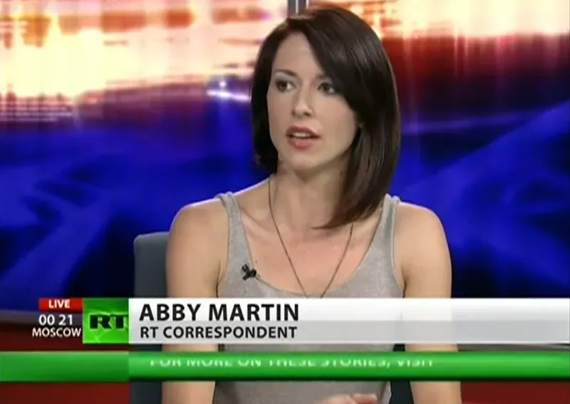 A screenshot of Abby Martin on Russia Today (RT).