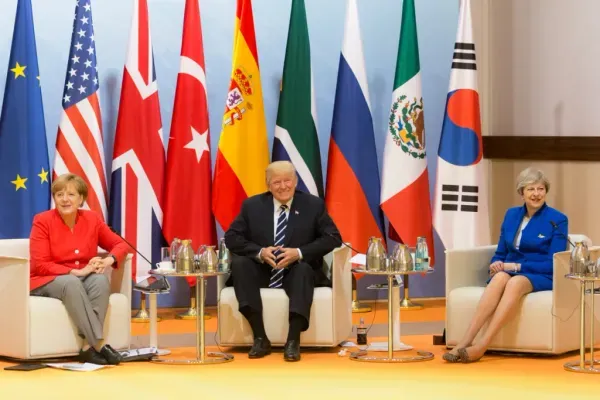 Angela Merkel, Donald Trump, and Theresa May.