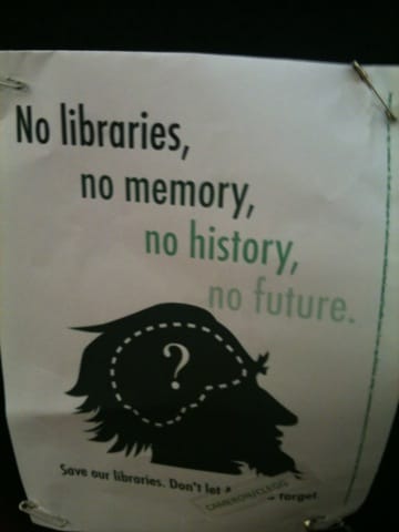 A poster depicting a question mark in a brain with the text "No libraries, no memory, no history, no future."