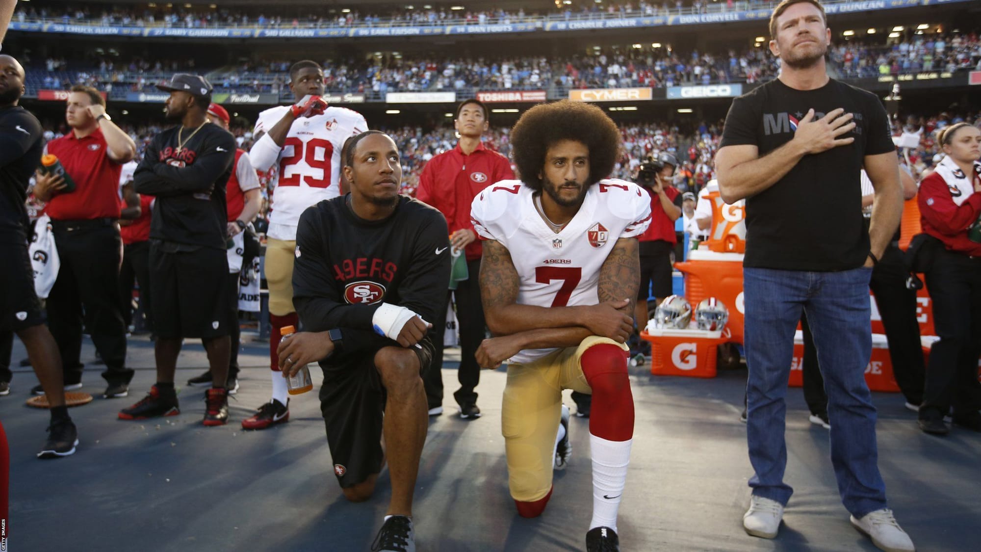 Colin Kaepernick taking the knee.
