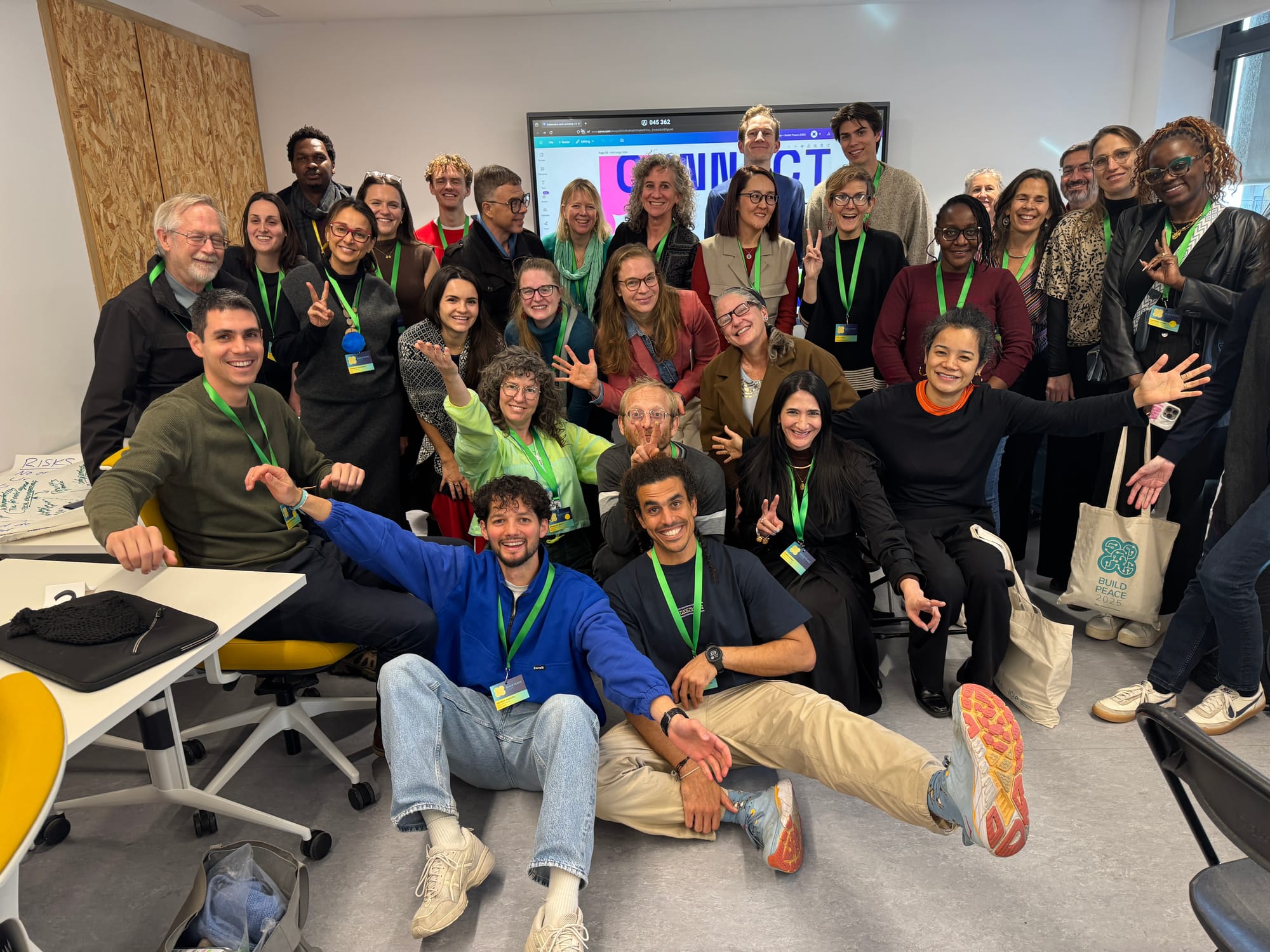 Group photo after the Deliberative Tech workshop at Build Peace in Barcelona 🎉