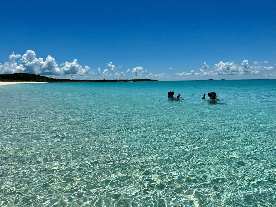 Two people in clear blue wat