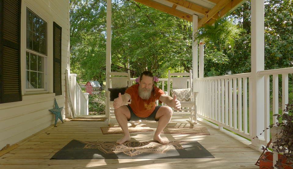 Image of Larry in the squat portion of a basic monkey movement.
