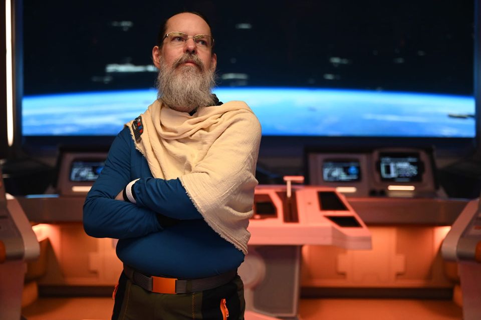 A picture of Larry, dressed like a Star Wars character, on the bridge of an MPO-1400 Purgill-class star cruiser.
