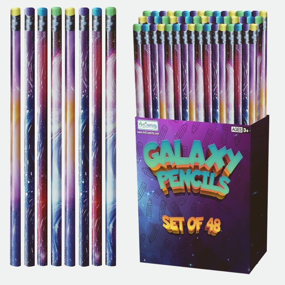of a child's watercolor painting showing a swirling galaxy in deep blues and purples on white paper, salt crystals visible on