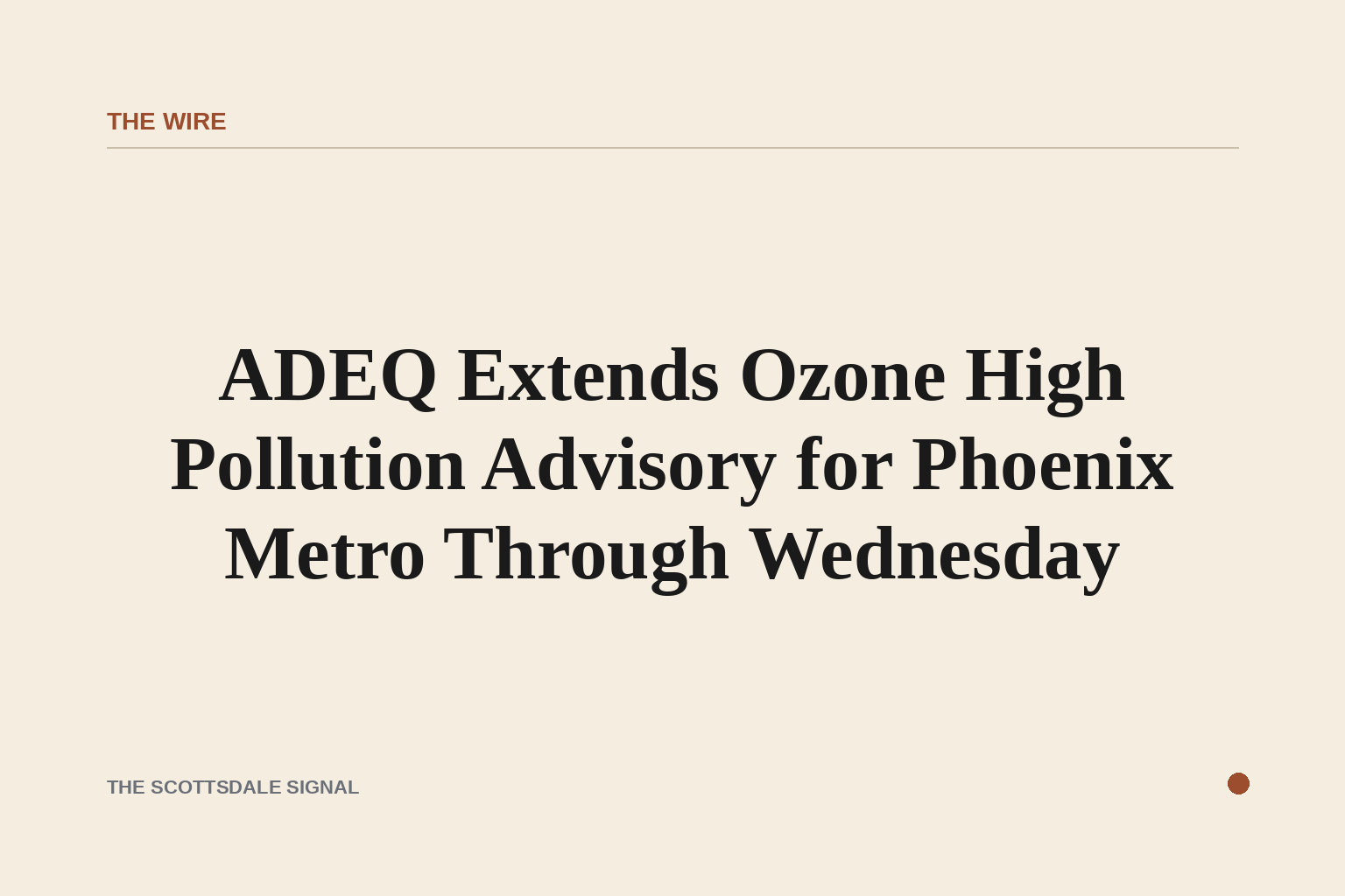 of a hazy Phoenix-area sky at midday, sun diffused through brownish smog, desert landscape in foreground, no people