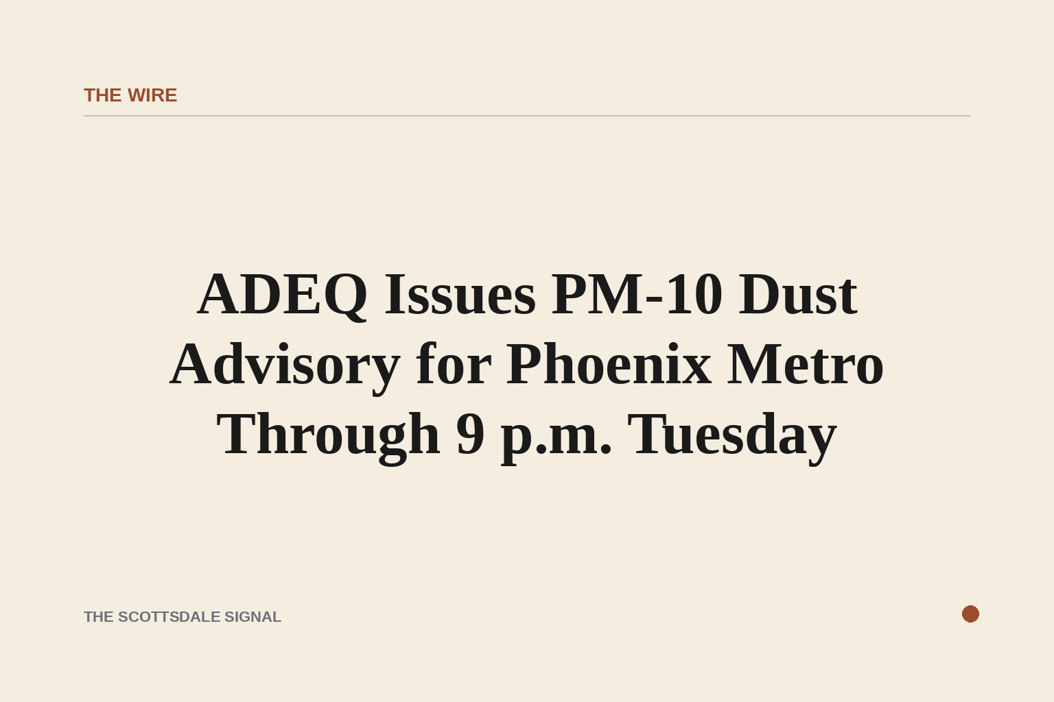 of a hazy desert sky over a flat urban valley, thick brown dust obscuring the horizon at midday