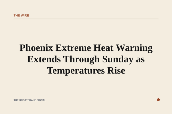 Wide aerial view of a sun-baked desert valley at midday, heat shimmer rising from pale earth, cloudless sky, no people