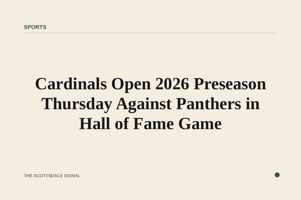 of an empty NFL stadium at dusk, field lights on, goalposts visible against a darkening sky