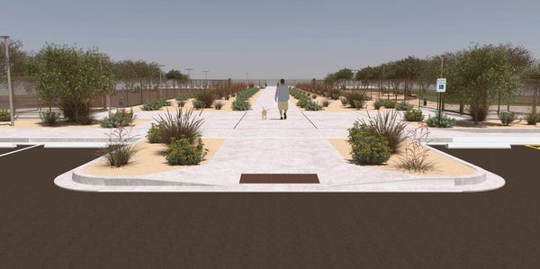 of a desert dog park at golden hour, low fencing, gravel paths, and McDowell Mountains in the background, no people or animal