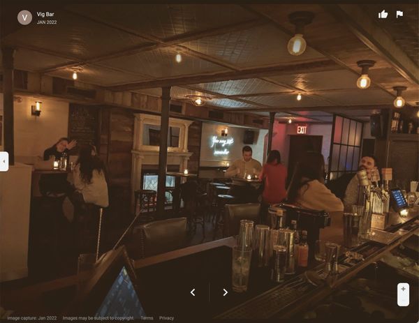 of a stainless steel commercial dishwasher rack with water droplets, industrial kitchen setting, no people