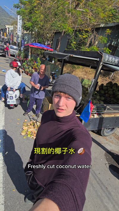 Freshly cut coconut water in Shuili!! 🥥