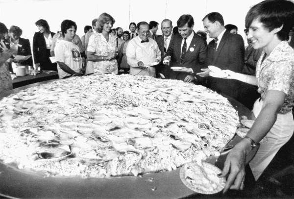 Florida Governor Bob Graham serves slices from the World's Largest Key Lime Pie. 