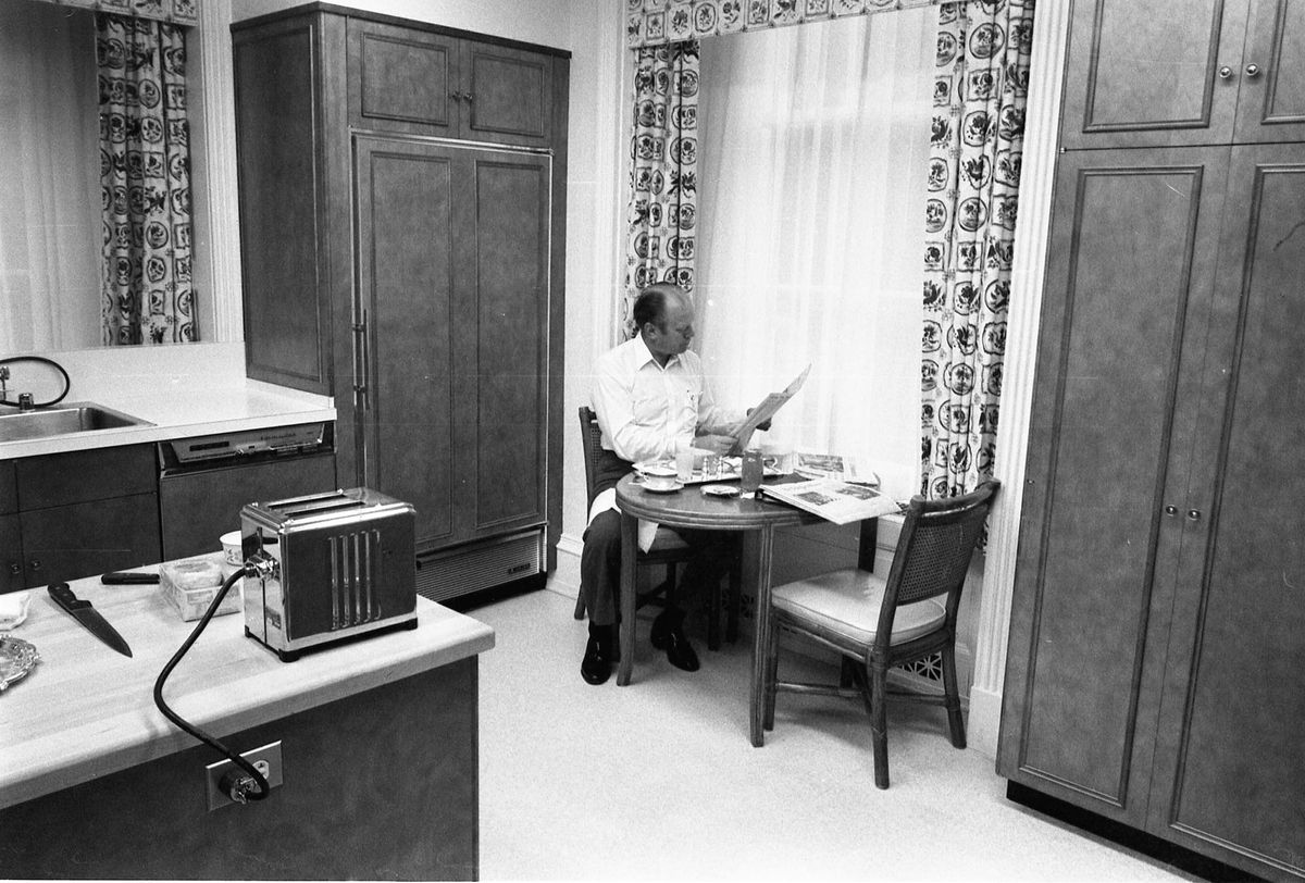 President Gerald Ford reading the newspaper. 
