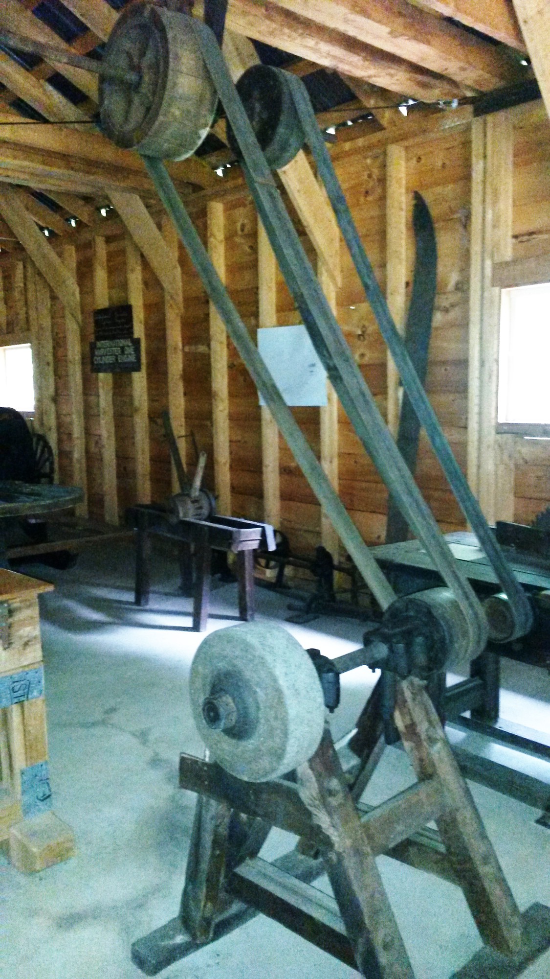 Belt-powered wheelwright workshop at Woodsmen's museum