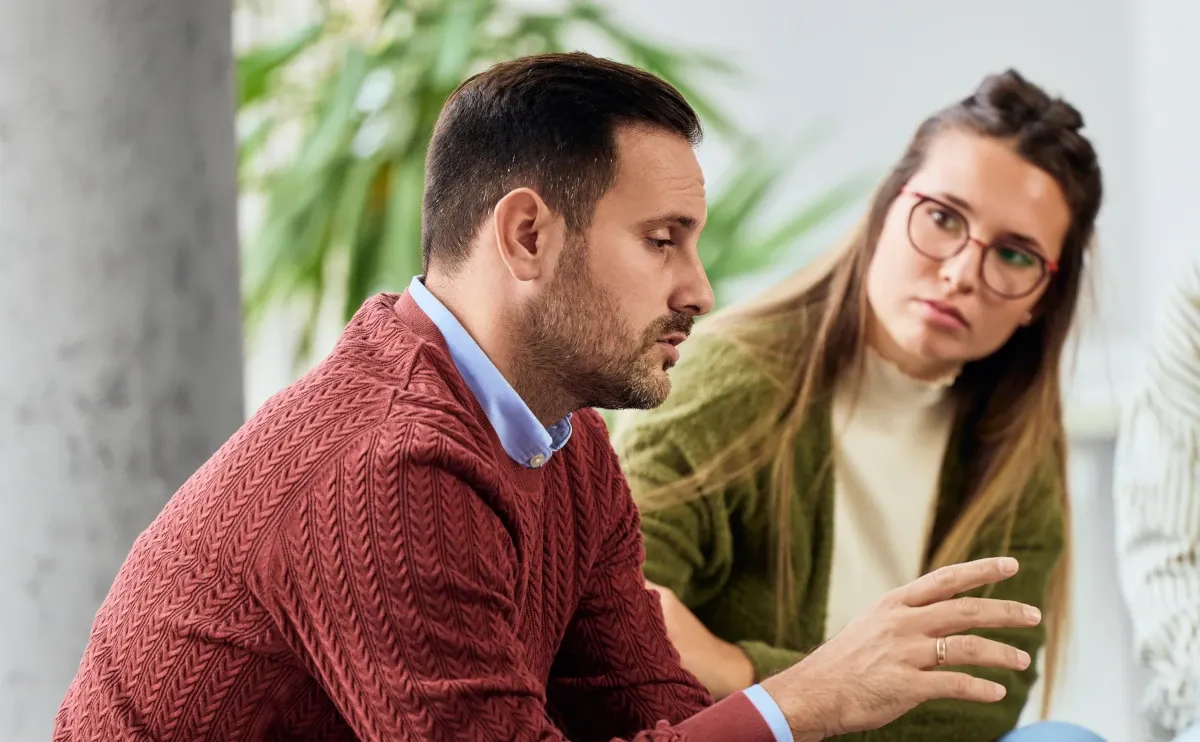 A small group discussing a sensitive topic