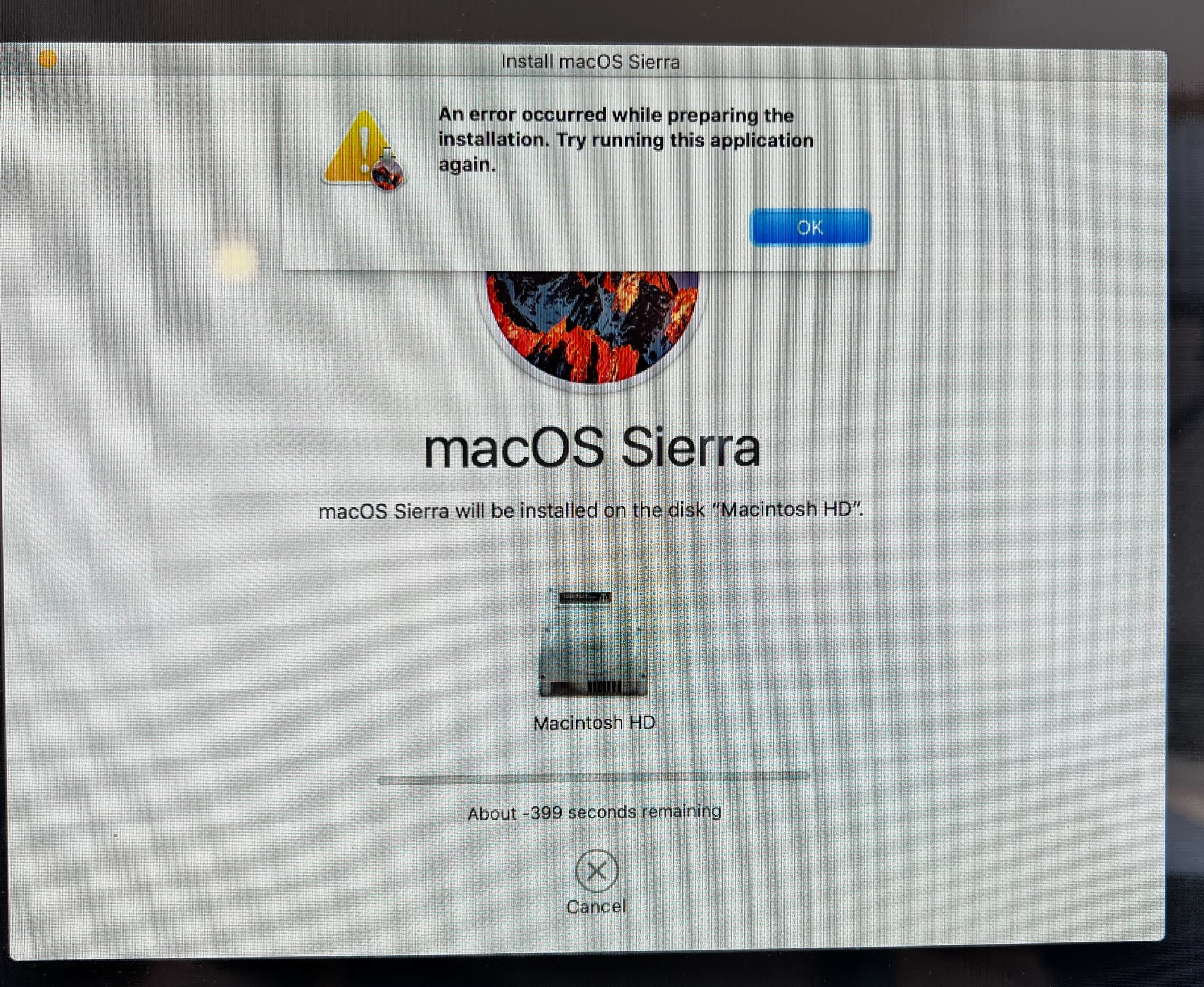 Photo of an iMac with "An error occurred while preparing the installation. Try running this application again." error on screen