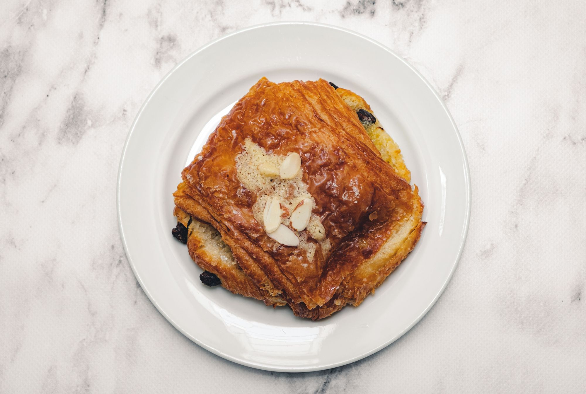 A Bread Affair Chocolate Almond Croissant –&nbsp;Overhead