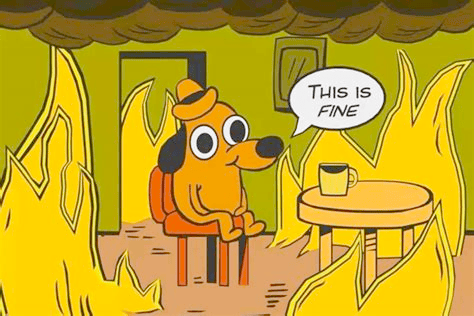 Cartoon dog sits calmly in a burning room saying "This is fine," used to show how crisis gets normalised.