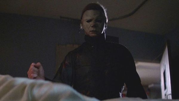 Michael Myers stands over a hospital bed in Halloween II (1981).