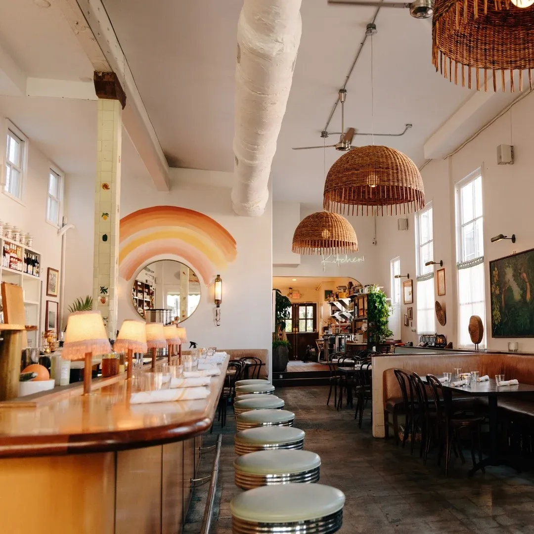 visit charleston sc. Interior of the restaurant basic kitchen with tables and bar without people.