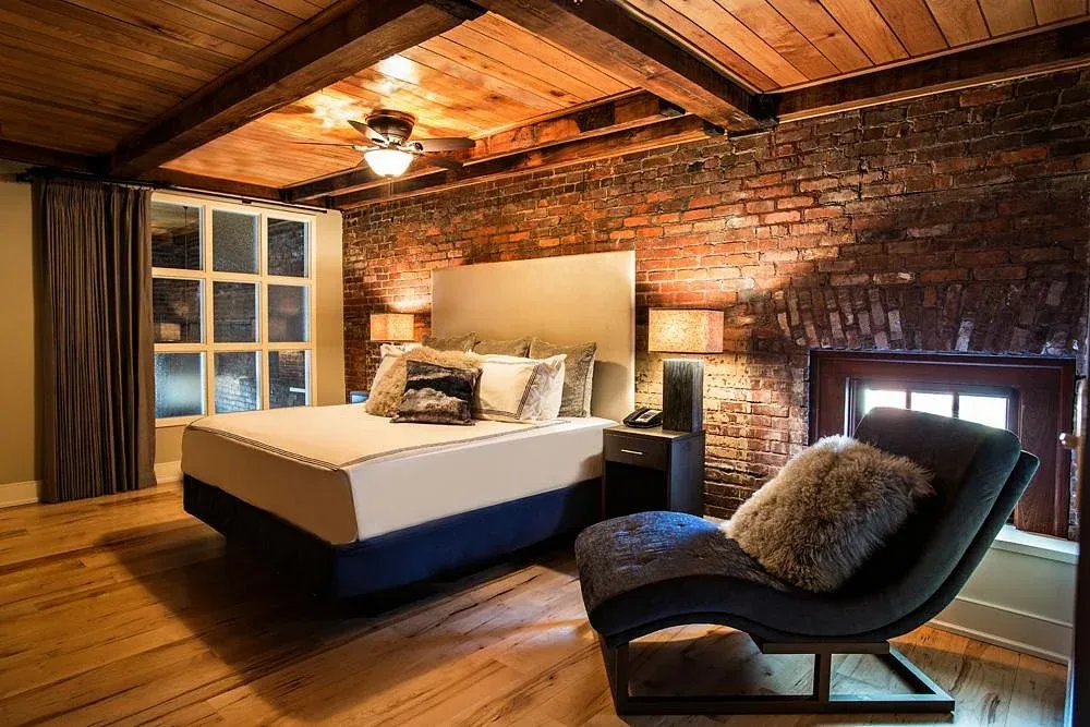bedroom with a bed and s sofa.
