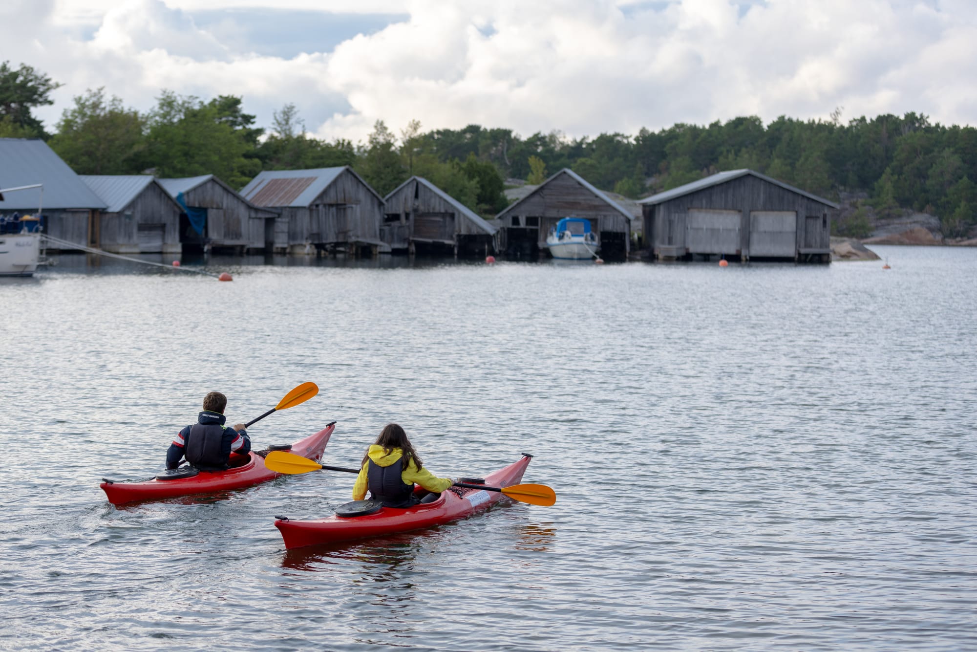 People kayaking in the baltic sea in Åland.