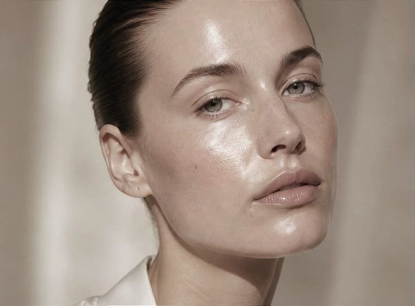 A model with bright, glowing skin following a luxury facial treatment at a top medspa in Beverly Hills.