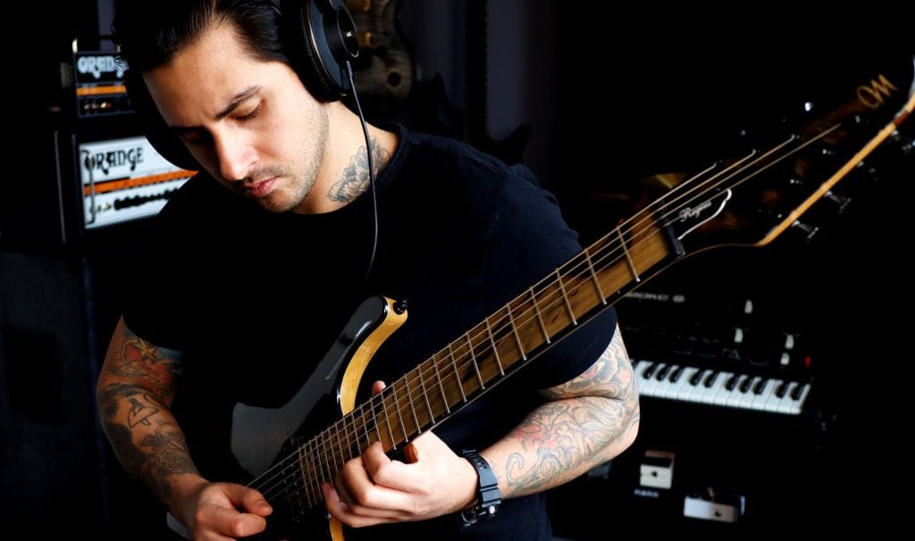 Edward Ray playing guitar