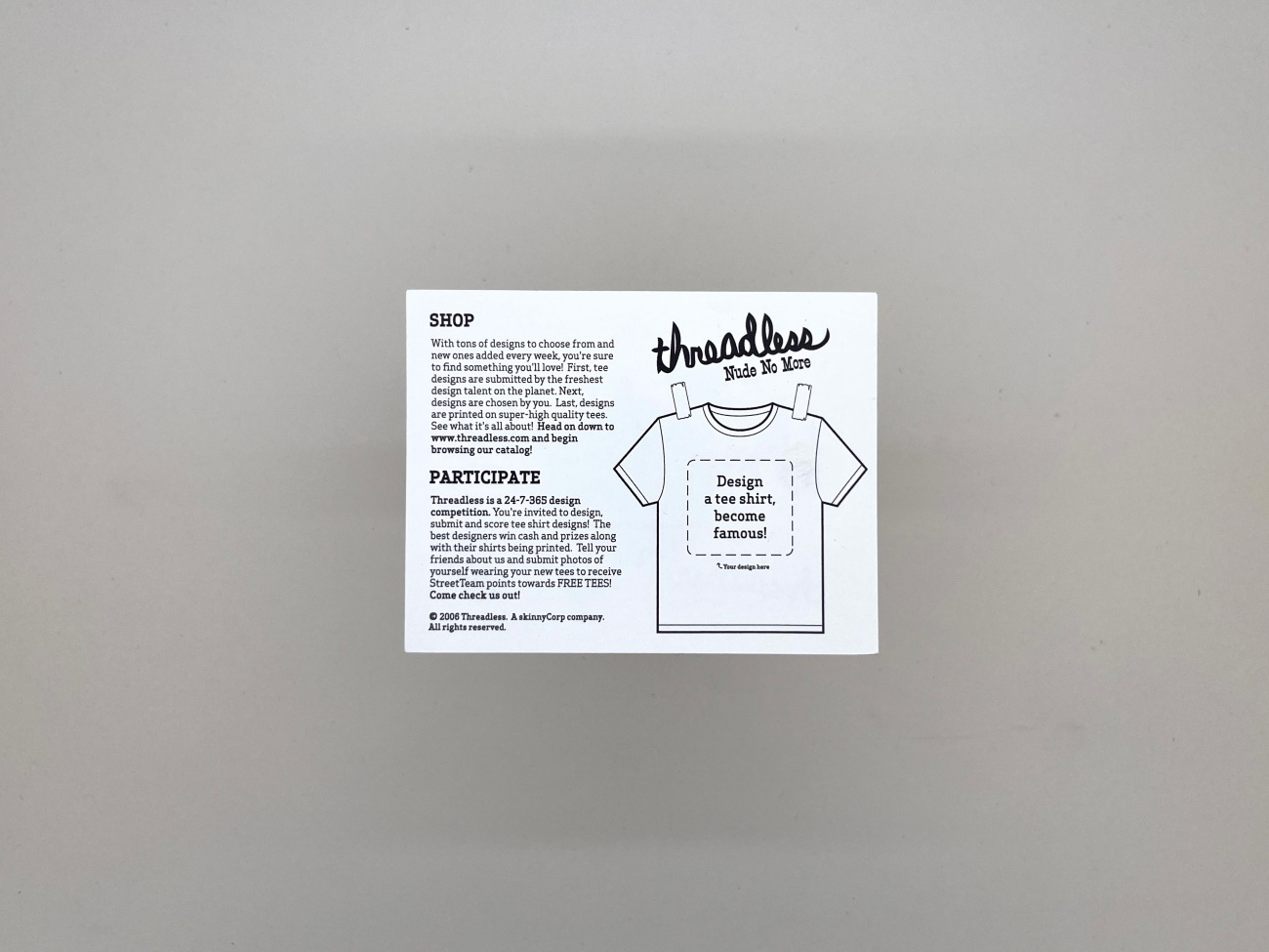 The reverse of the sticker with a info on the threadless shop and an invite design a t-shirt and become famous (if you win).