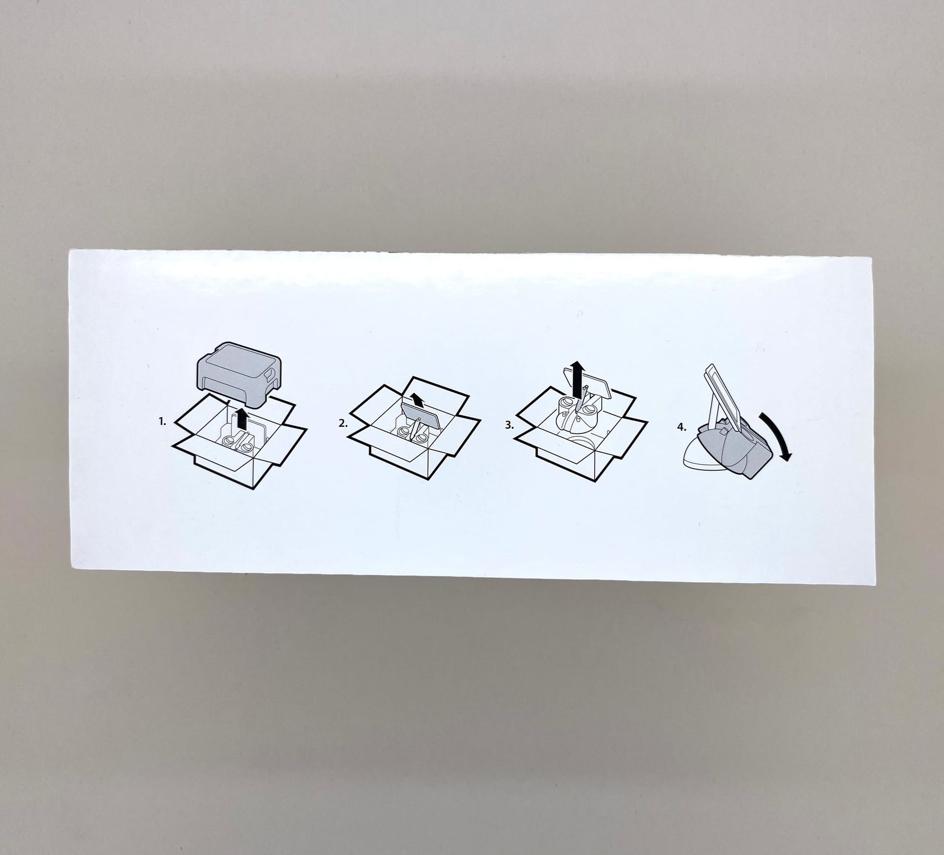 iMac unboxing illustration. Showing how to open the box and take it out correctly.