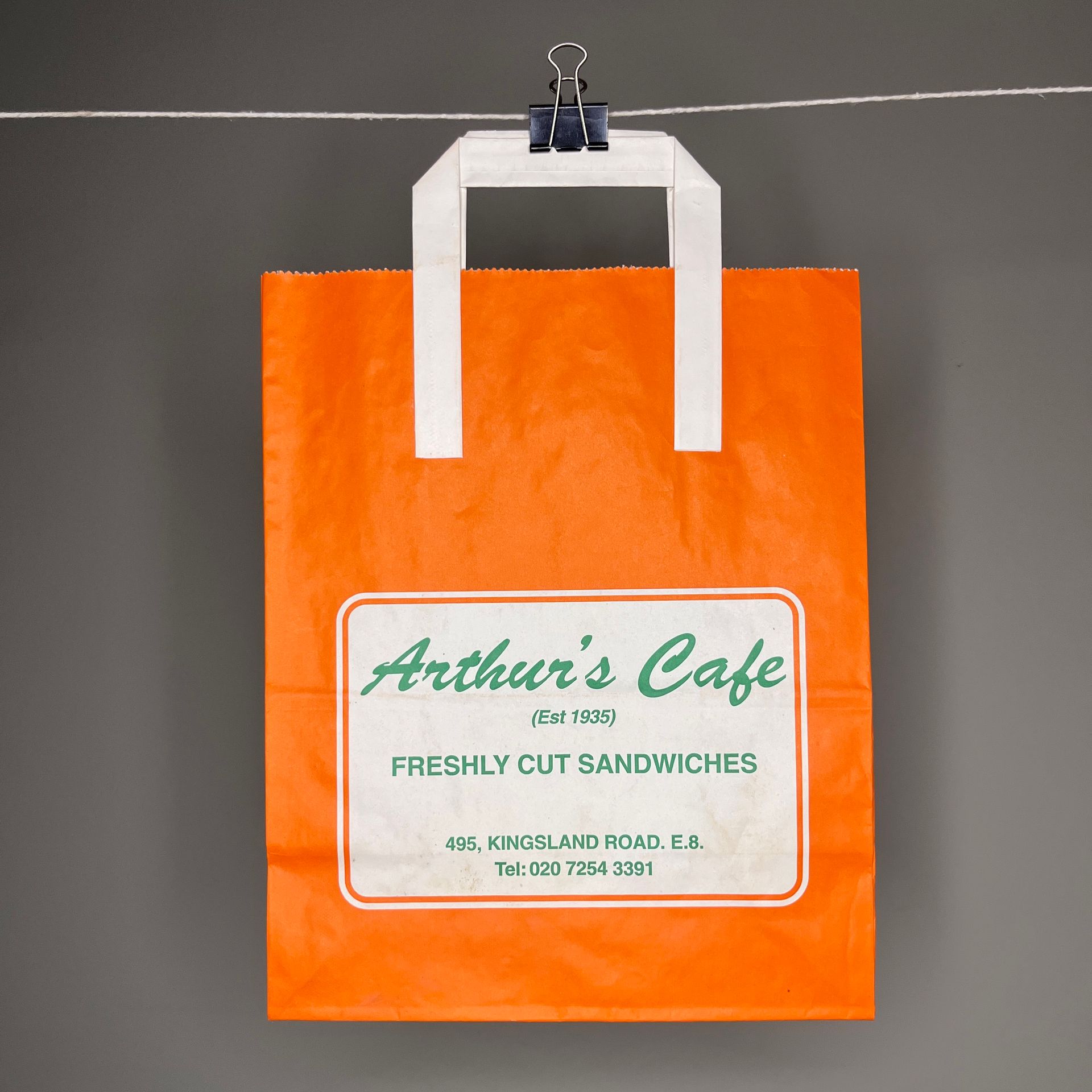 Arthur's Cafe orange bag