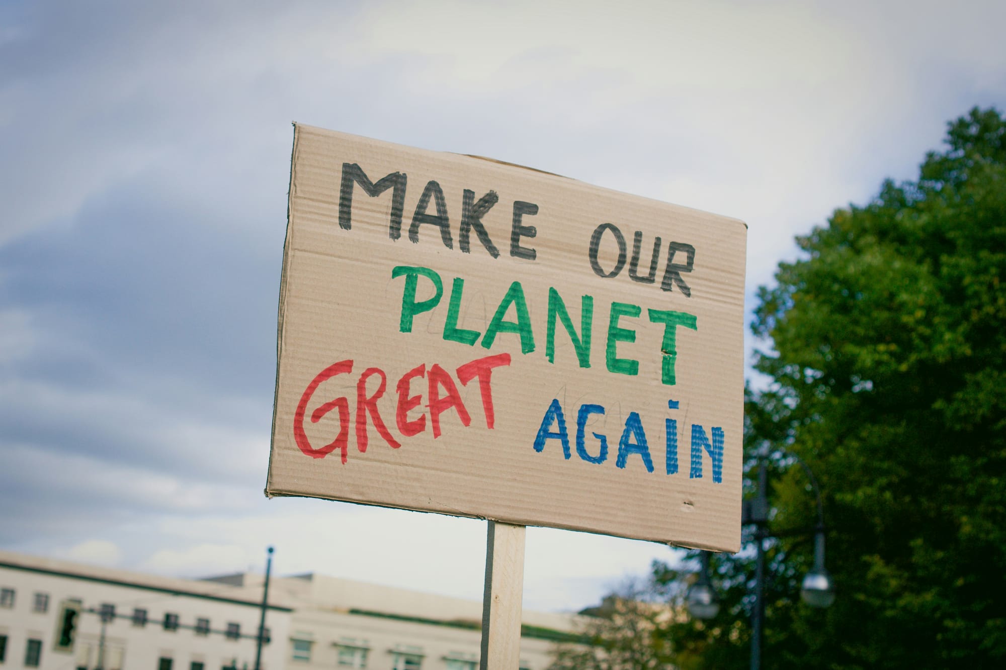 Make Our Planet Great Again protest sign