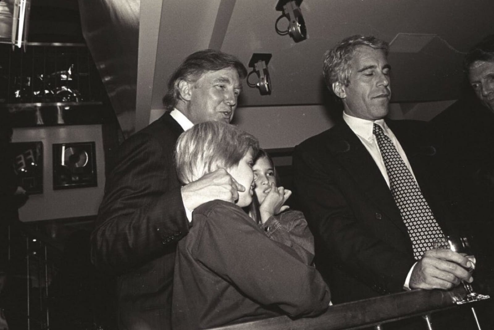 Donald Trump with children Eric and Ivanka in the company of Jeffrey Epstein