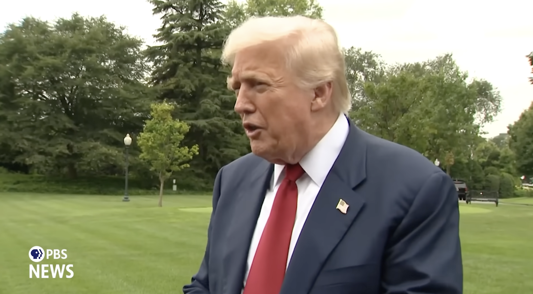 PBS News screenshot shows a still-blond Trump speaking to reporters after firing the head of BLS in August 2025