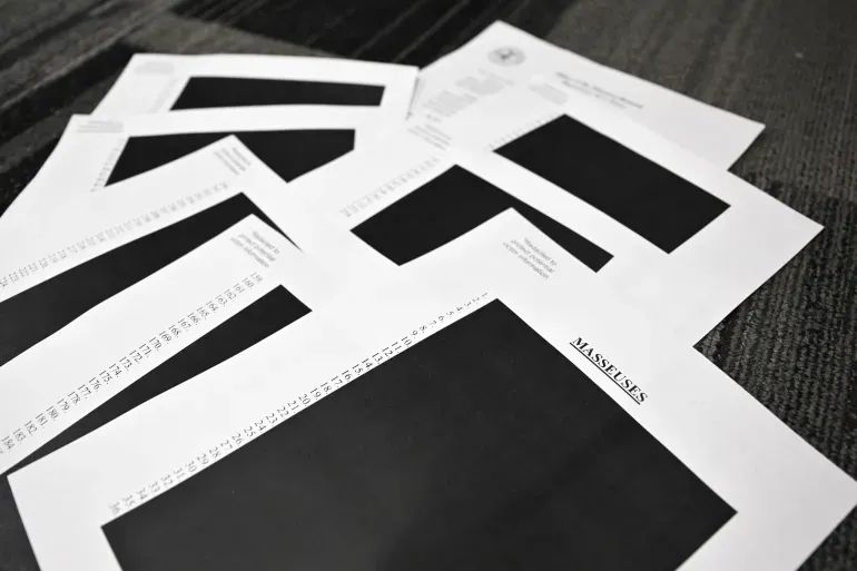 The December Releases: Redactions, Faulty Blackouts, Grand Jury Testimony, and the Cover Up