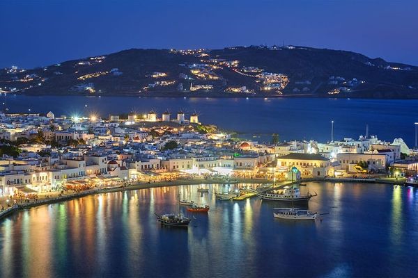 A private jet flew Romanian officials to the Greek island of Mykonos to meet unnamed US investors