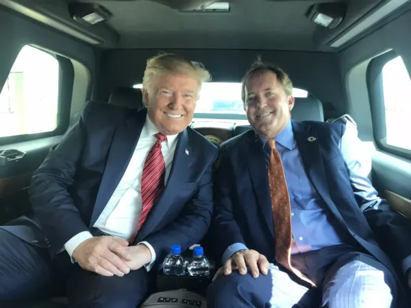 Paxton partied in Dubai with two men facing federal fraud charges, received $190,000 donation from one
