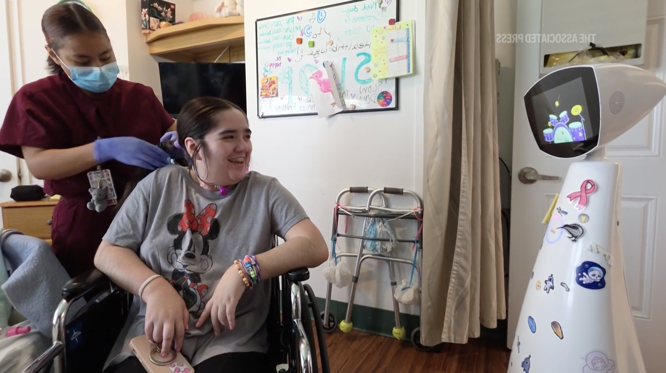 AI-powered hospital robot entertaining a pediatric patient to improve the hospital experience