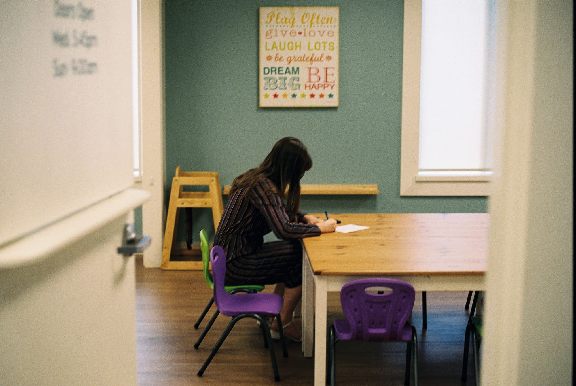 Emma, slowing down and writing her vows, at the beginning of her wedding day.