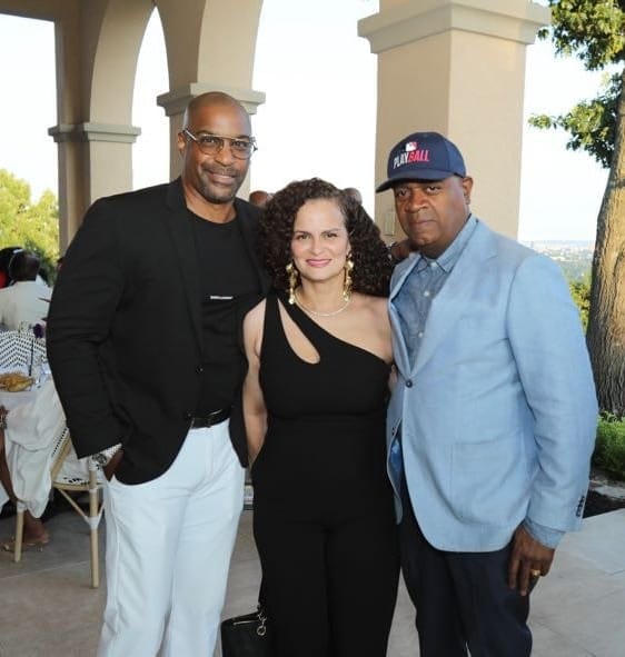 J. Wayman Henry III, Margarita Duran, and Newark Mayor Ras J. Baraka pose together at Unity Table’s outdoor event.