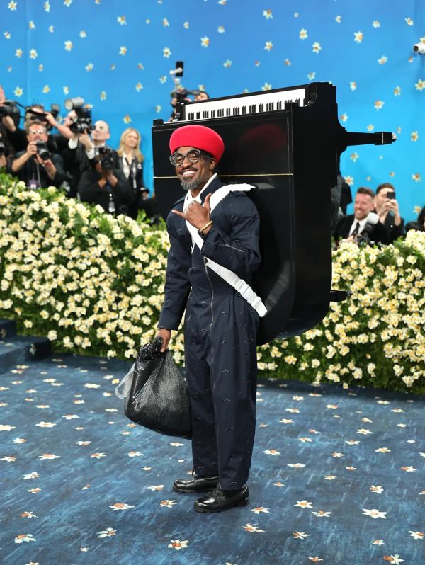 Andre 3000 Carries Piano on His Back at 2025 Met Gala & Drops New Piano Album at the Same Time