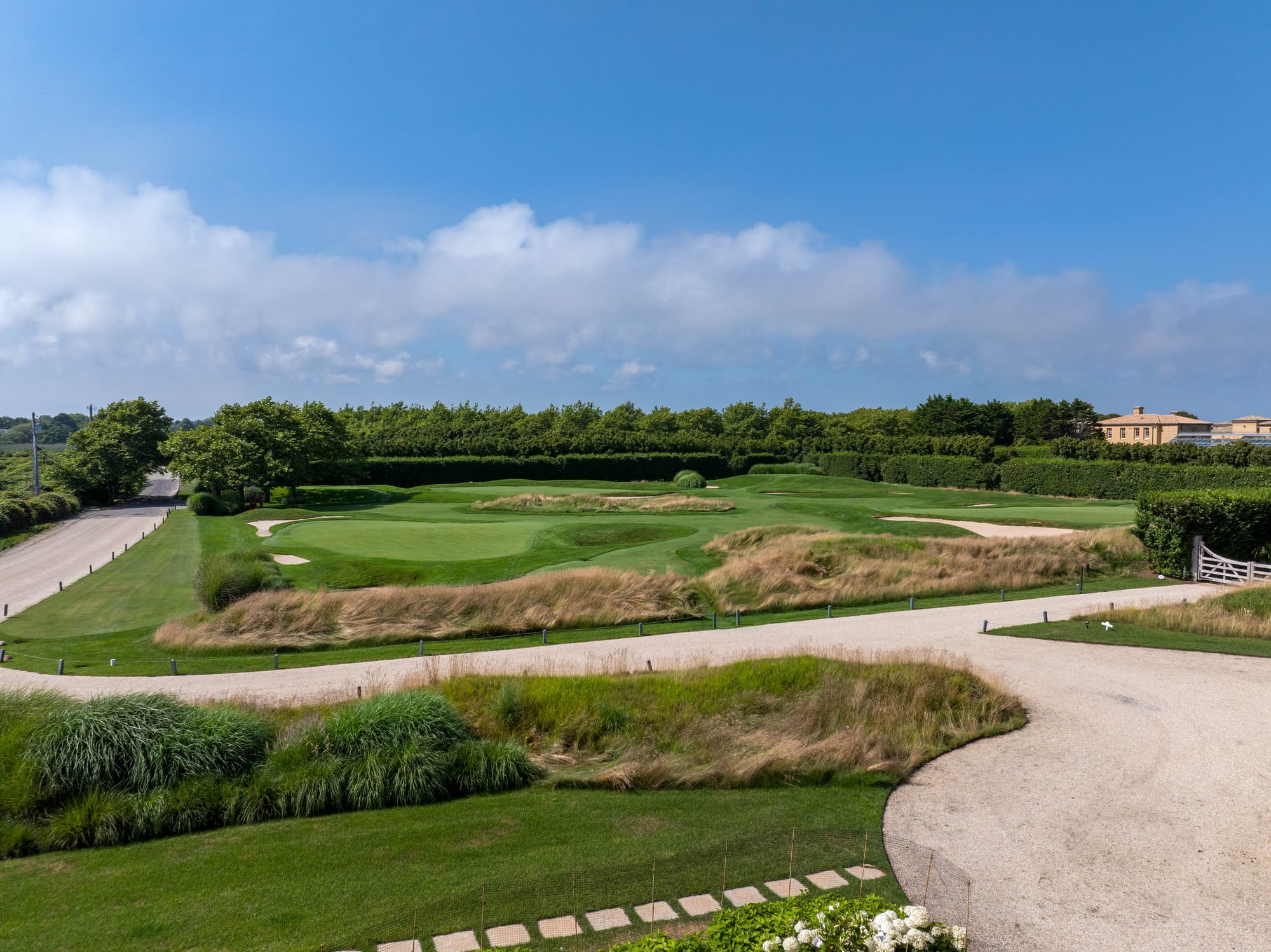 The Private Golf Course at 407 Fairfield Pond Lane, Viewed from the Front Entryway of 21 Fairfield Pond Lane - Courtesy SERHANT. - Photographer Josh Goetz